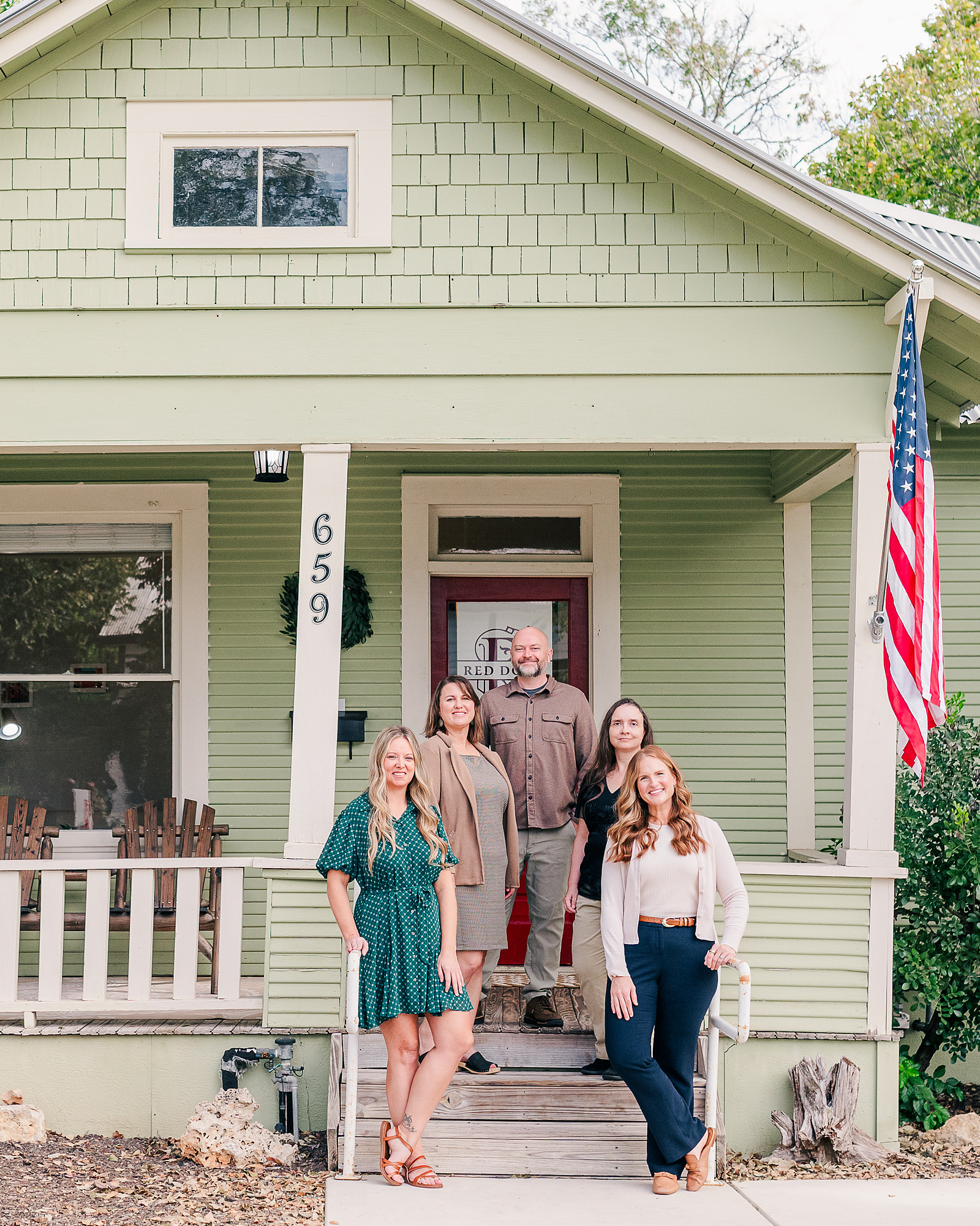 The Red Door Taxes team at the front of the office at 659 S. Castell Ave